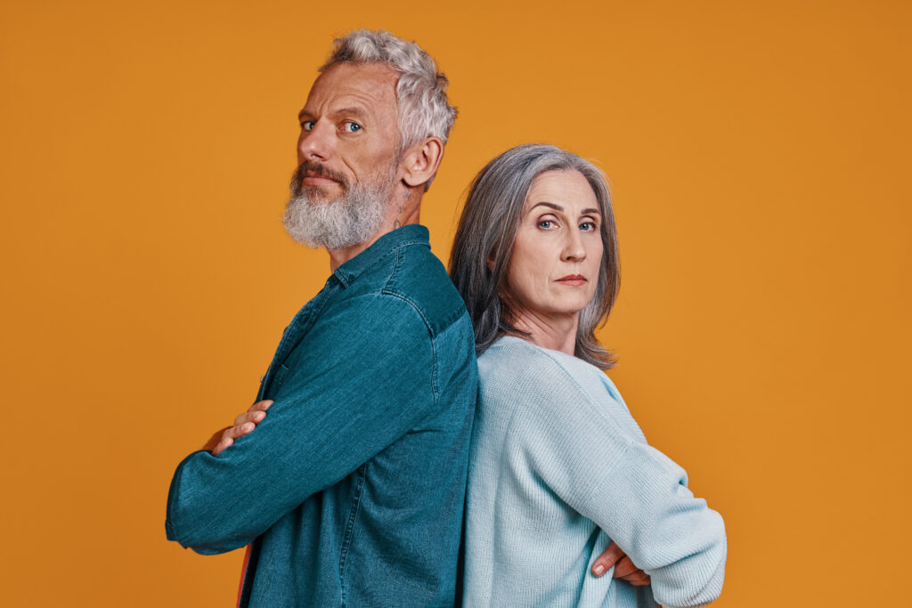 Skilled professional couple in their 60s working on their own terms