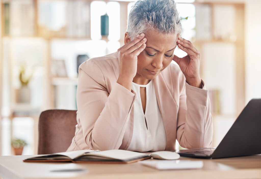A person in their early 60s looking ahead thoughtfully — UK retirement planning